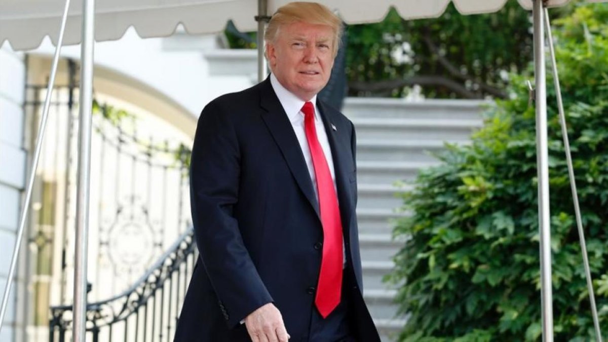 Donald Trump a las puertas de la Casa Blanca.-YURI GRIPAS / AFP
