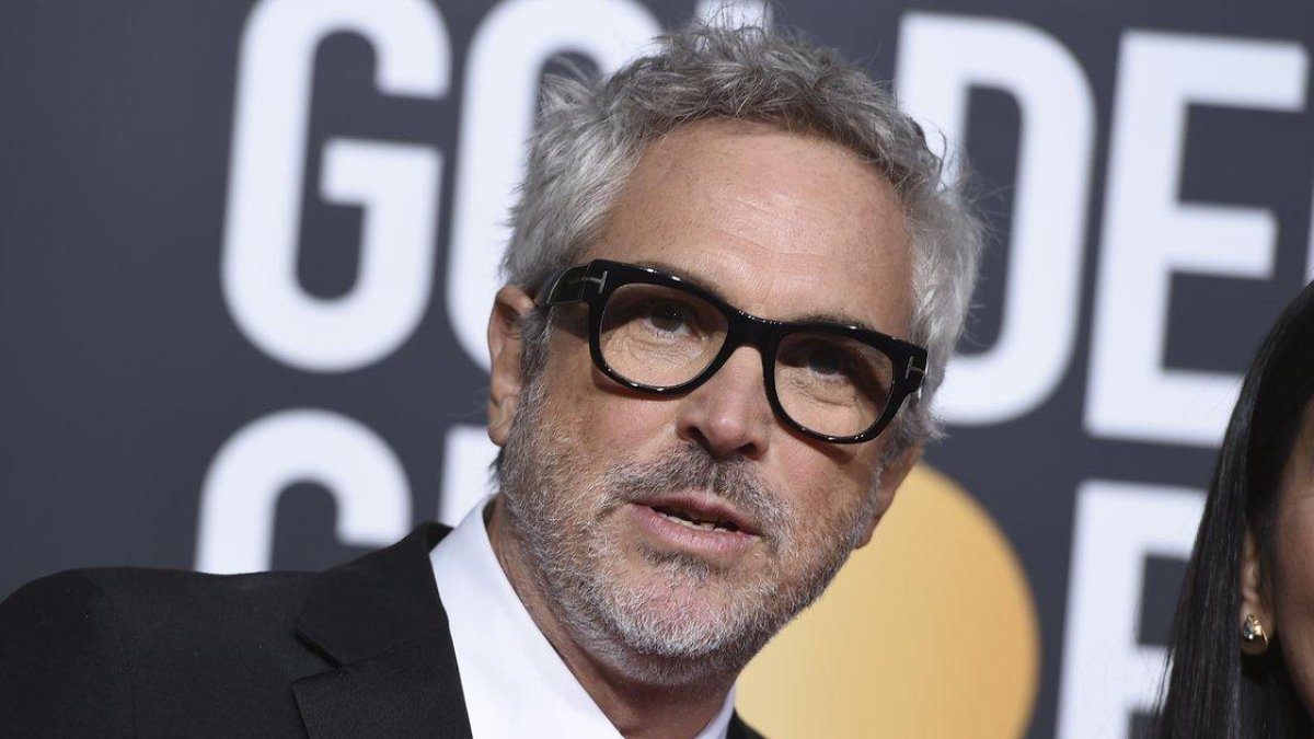 Alfonso Cuarón y su película Roma se llevaron los premios a mejor director y mejor película extranjera, respectivamente.-INVISION