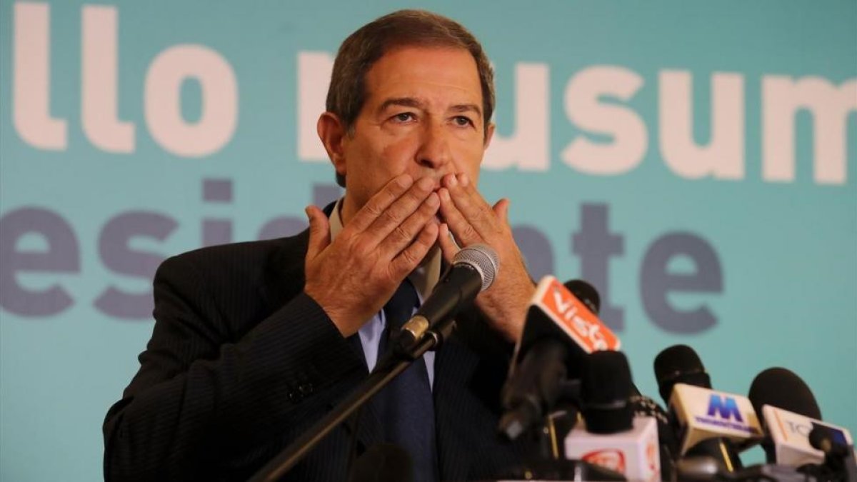 Nello Musumeci, tras su victoria en las elecciones autonómicas en Sicilia.-AFP / CARMELO LENZO