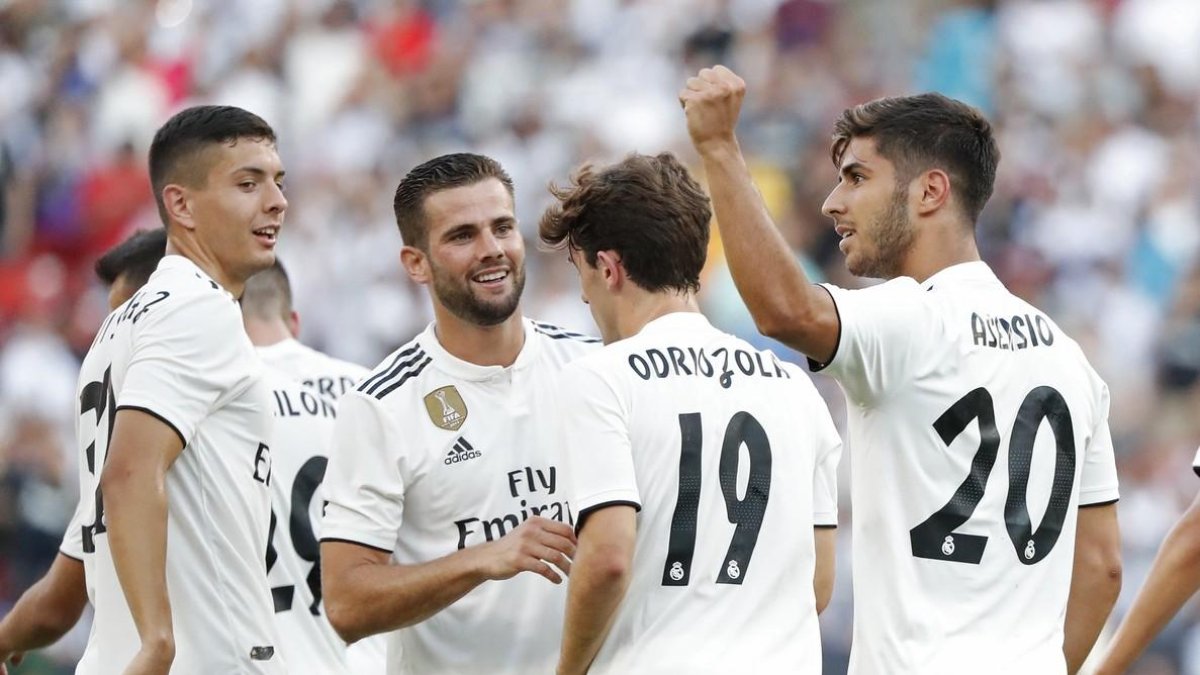Asensio celebra un gol junto a sus compañeros en el Real Madrid-Juventus-GEOFF BURKE (USA TODAY)