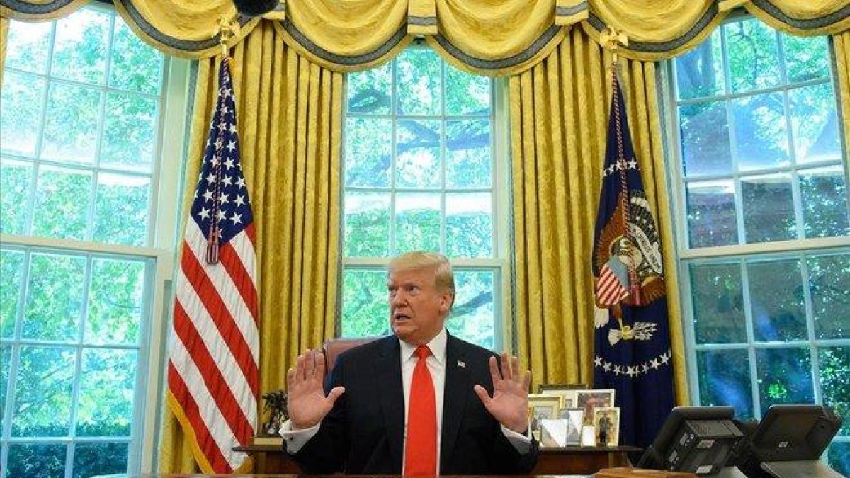 El presidente de los Estados Unidos, Donald Trump, en la Oficina Oval en la Casa Blanca en Washington DC.-JIM WATSON (AFP)