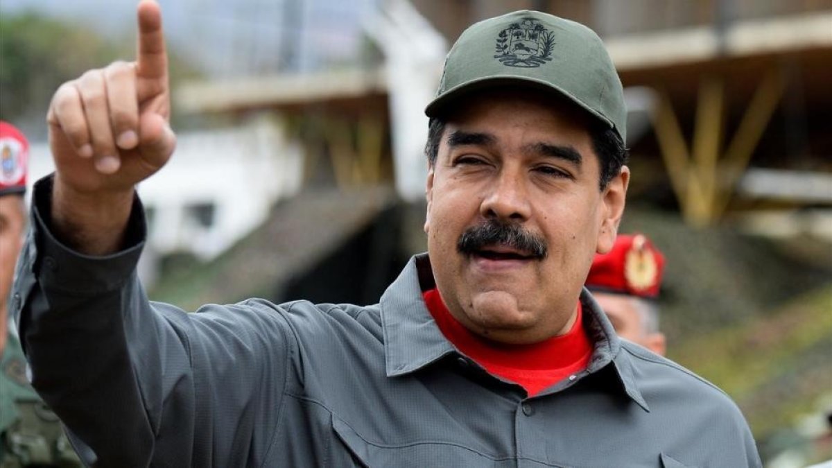 El presidente venezolano, Nicolás Maduro, en unos ejercicios militares el pasado 24 de febrero.-/ AFP / FEDERICO PARRA