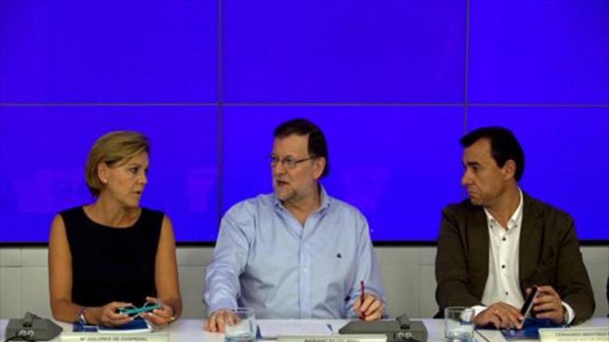 Cospedal, Rajoy y Martínez-Maillo, en el comité ejecutivo nacional del PP.-EFE / XOÁN REY / DAVID CASTRO