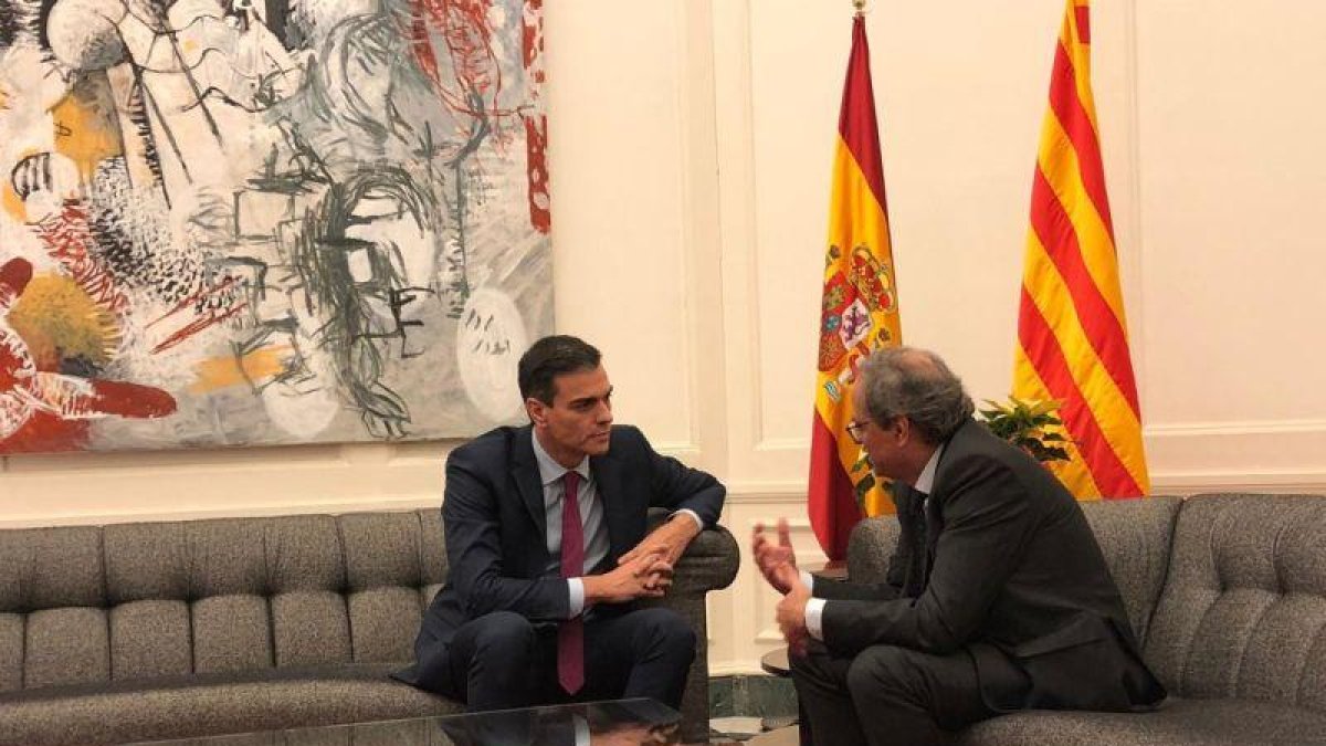 Pedro Sánchez y Quim Torra, en el Palau de Pedralbes, el 20 de diciembre.-EL PERIÓDICO