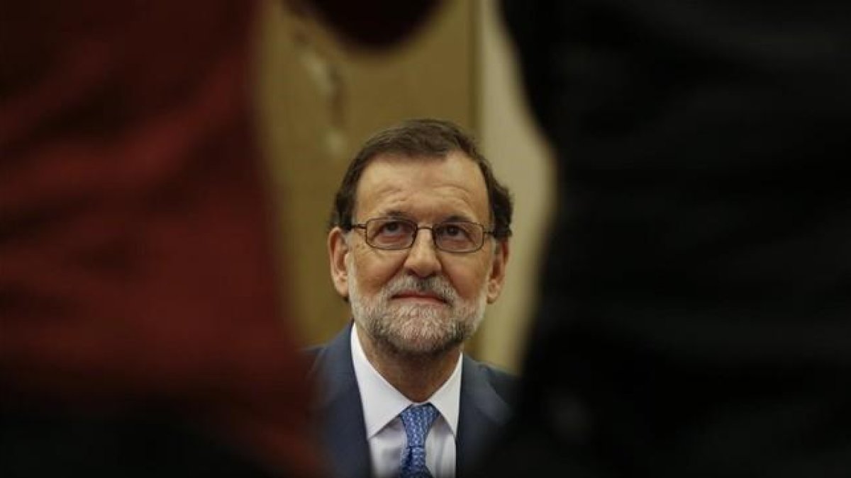 Mariano Rajoy, al inicio de su reunión con los parlamentarios del PP, este jueves.-REUTERS / SERGIO PEREZ