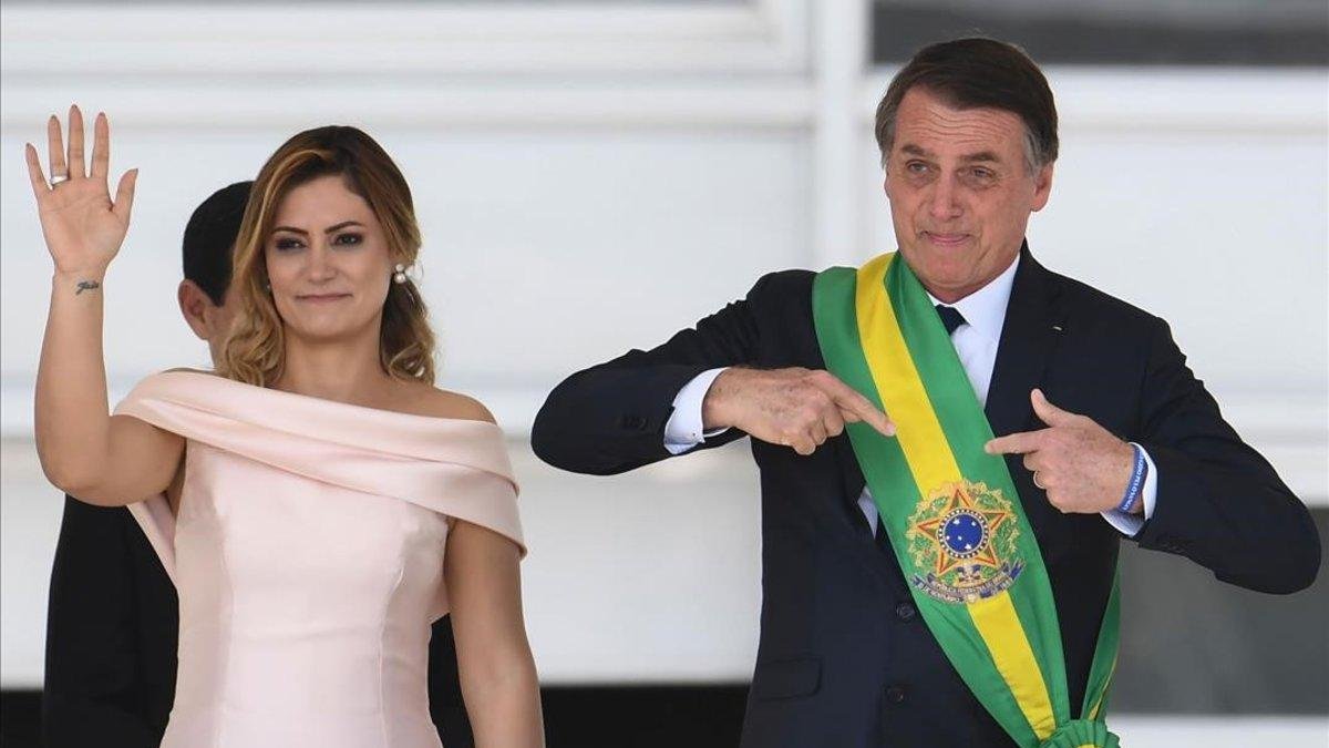 Michelle y Jair Bolsonaro, durante la toma de posesión del segundo como presidente de Brasil. Michelle y Jair Bolsonaro, durante la toma de posesión del segundo como presidente de Brasil.-EVARISTO SA (AFP)