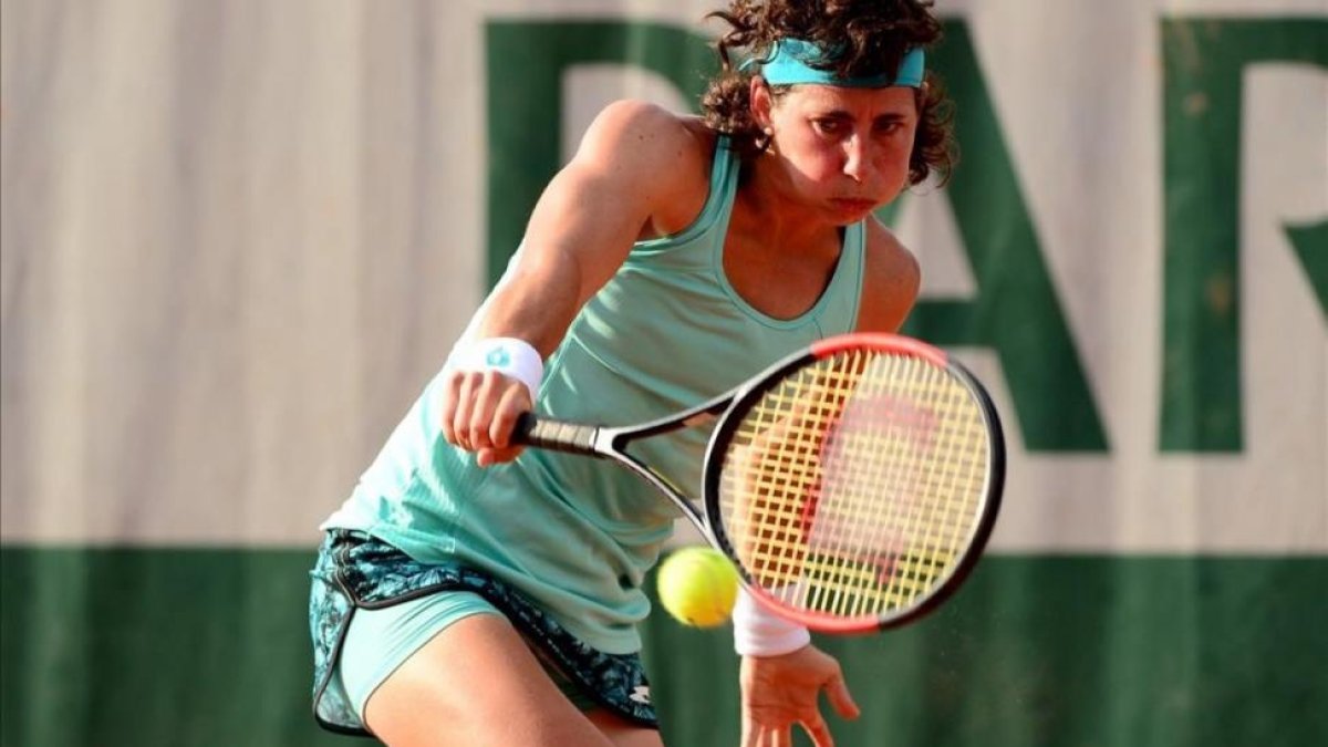 Carla Suárez, ayer durante su partido contra Maria Sakkari.-/ EFE / CAROLINE BLUMBERG