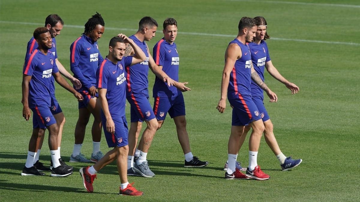 Lemar, Godín, Martins, Koke, Giménez, Arias, Saúl y Felipe Luis.-JOSE LUIS ROCA