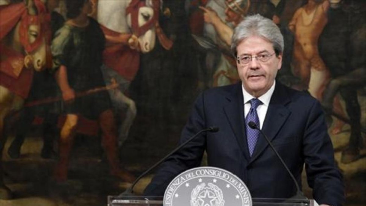 El primer ministro italiano, Paolo Gentiloni, durante una rueda de prensa en Roma.-AFP / TIZIANA FABI