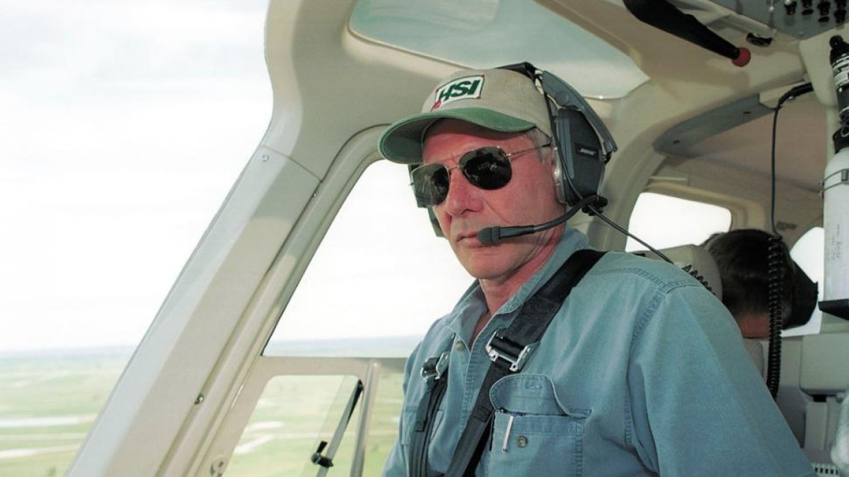 Harrison Ford, al mando de su helicóptero, en una imagen de archivo.-AFP