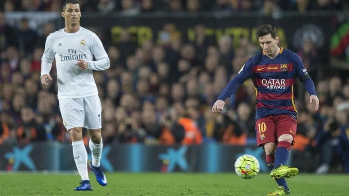 Cristiano y Messi en el Camp Nou.-