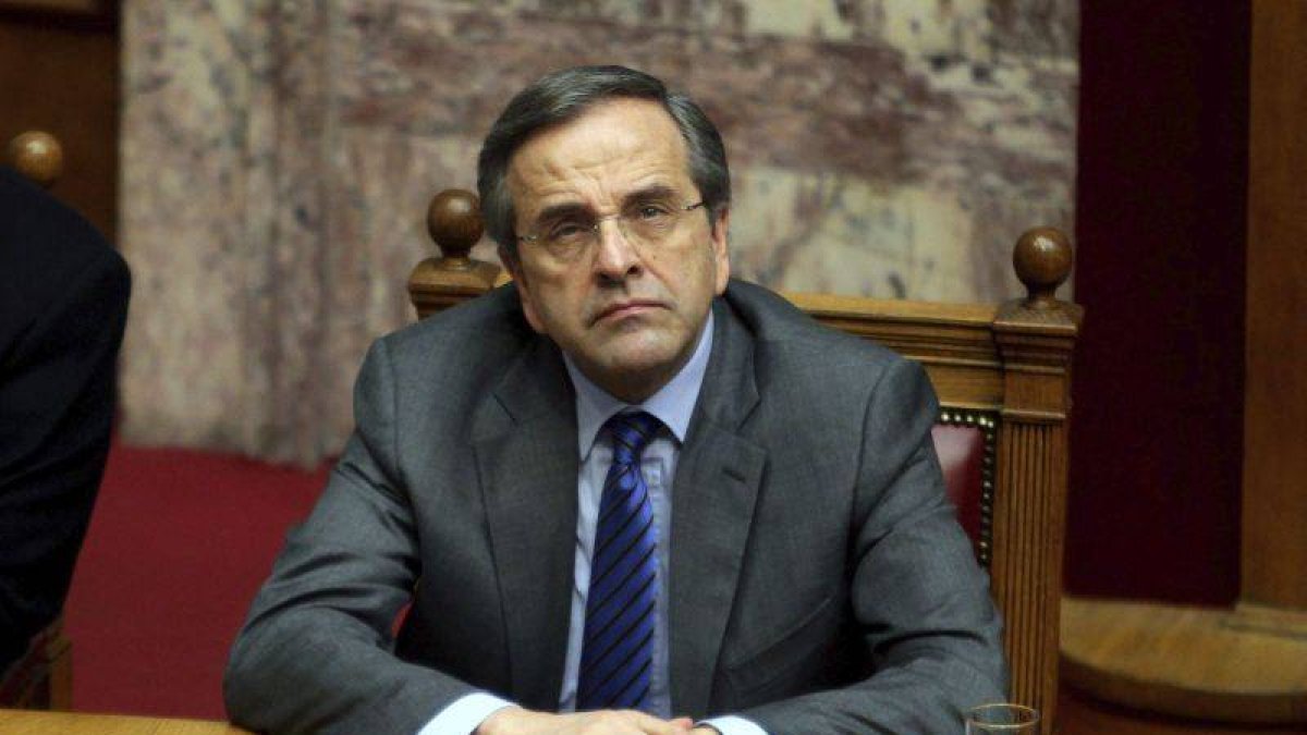 El conservador Antonis Samarás, primer ministro griego, pidiendo un voto responsable para hoy.-Foto: EFE / SIMELA PANTZARTZI