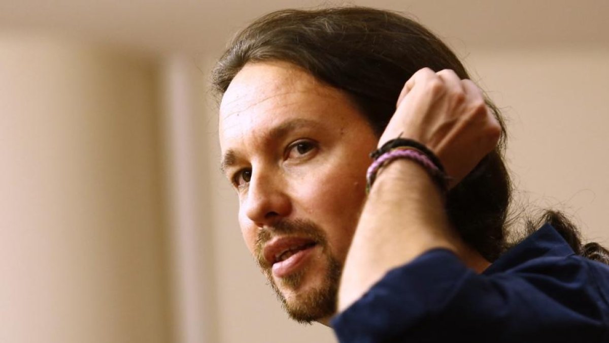 Pablo Iglesias, líder de Podemos, ha anunciado el acuerdo 'in extremis' de su formación con En Marea para las elecciones gallegas.-AGUSTÍN CATALÁN