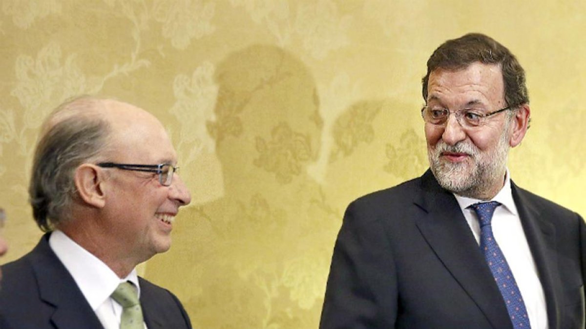 Cristóbal Montoro y Mariano Rajoy.-ARCHIVO / EFE