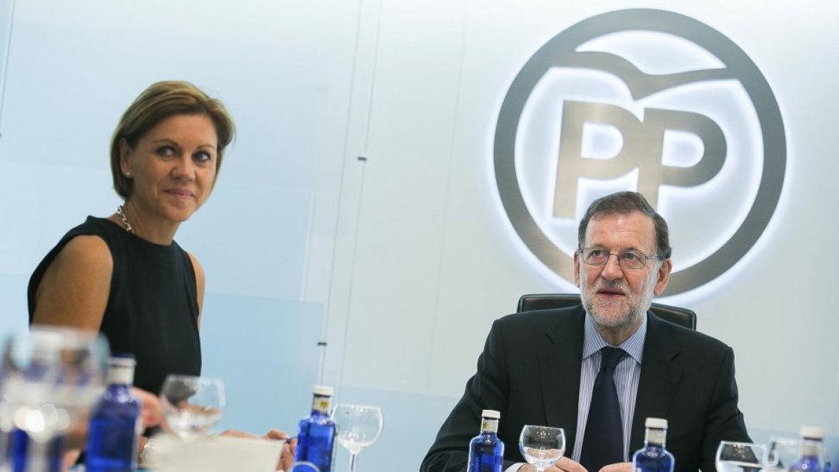 Mariano Rajoy y María Dolores de Cospedal.-E.M.
