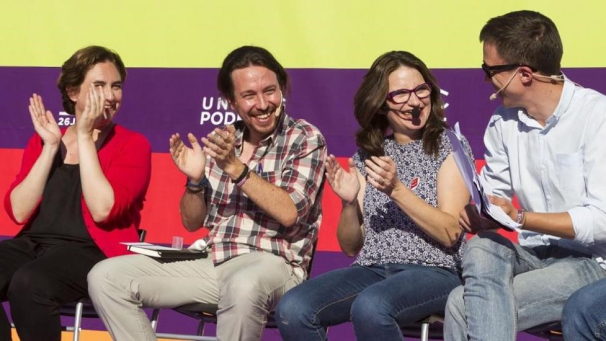 Ada Colau, Pablo Iglesias, Mònica Oltra e Íñigo Errejón durante el mitin en Palma.-CATI CLADERA/EFE