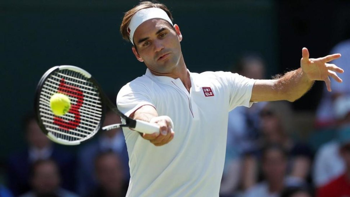 El tenista Roger Federer luciendo nueva marca en Wimbledon-ANDREW BOYERS