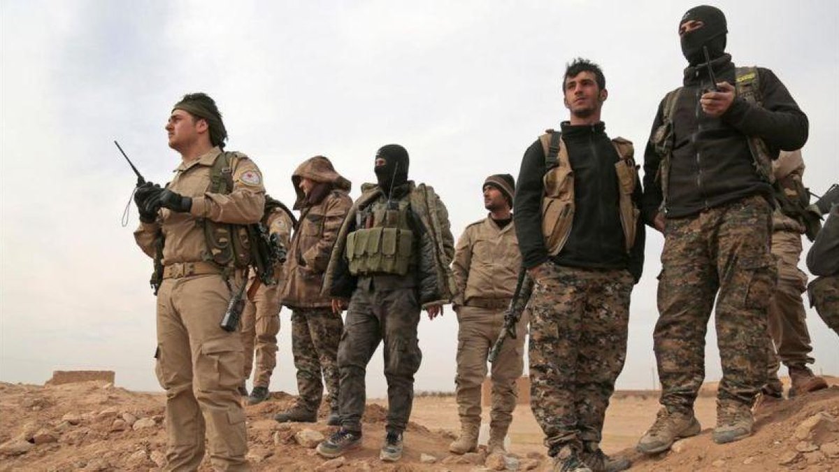 Miembros del las Fuerzas Sirias Democráticas que participan en la ofensiva contra el Estado Islámico en Raqqa.-REUTERS / RODI SAID