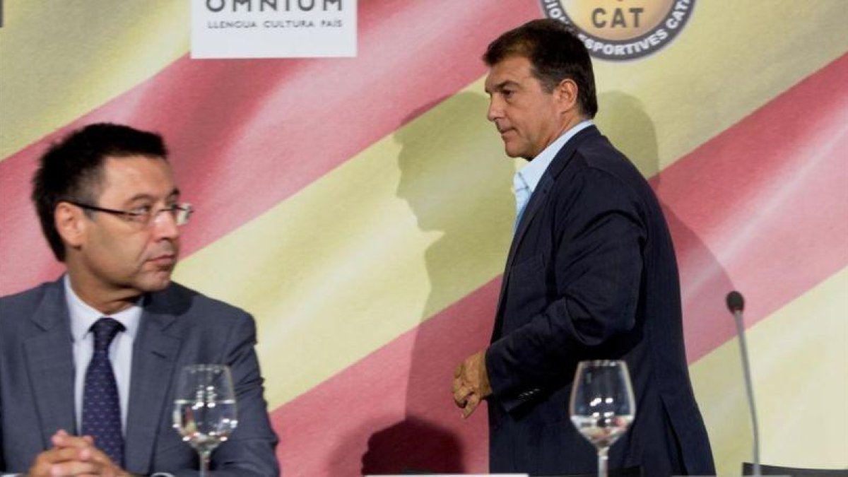 Bartomeu y Laporta, en un acto de la última campaña electoral por la presidencia del Barça.-FERRAN NADEU