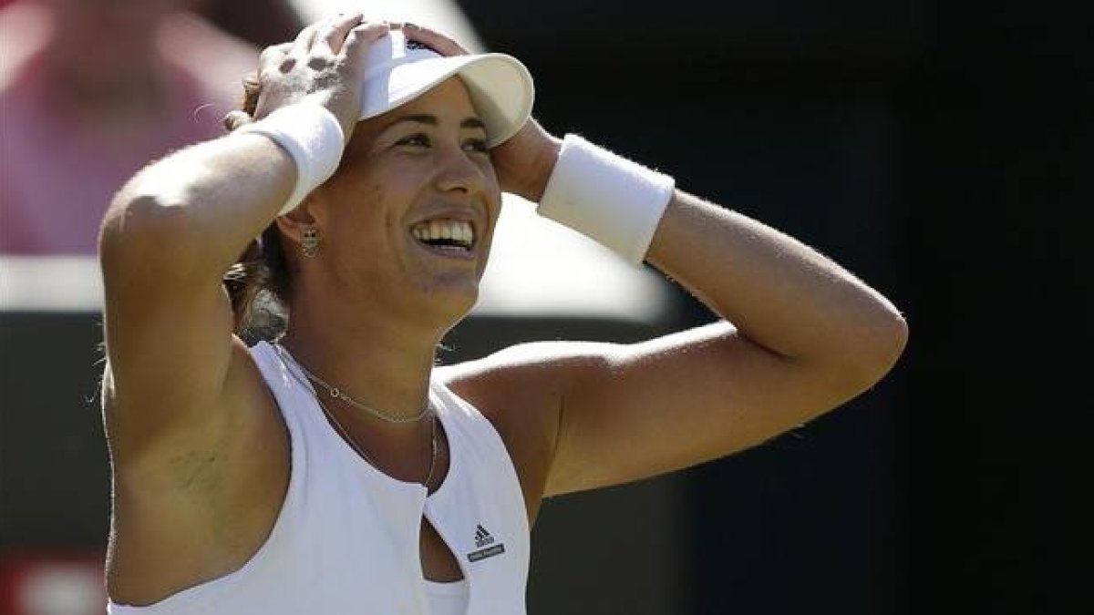 Muguruza celebra la victoria sobre Wozniacki.-REUTERS