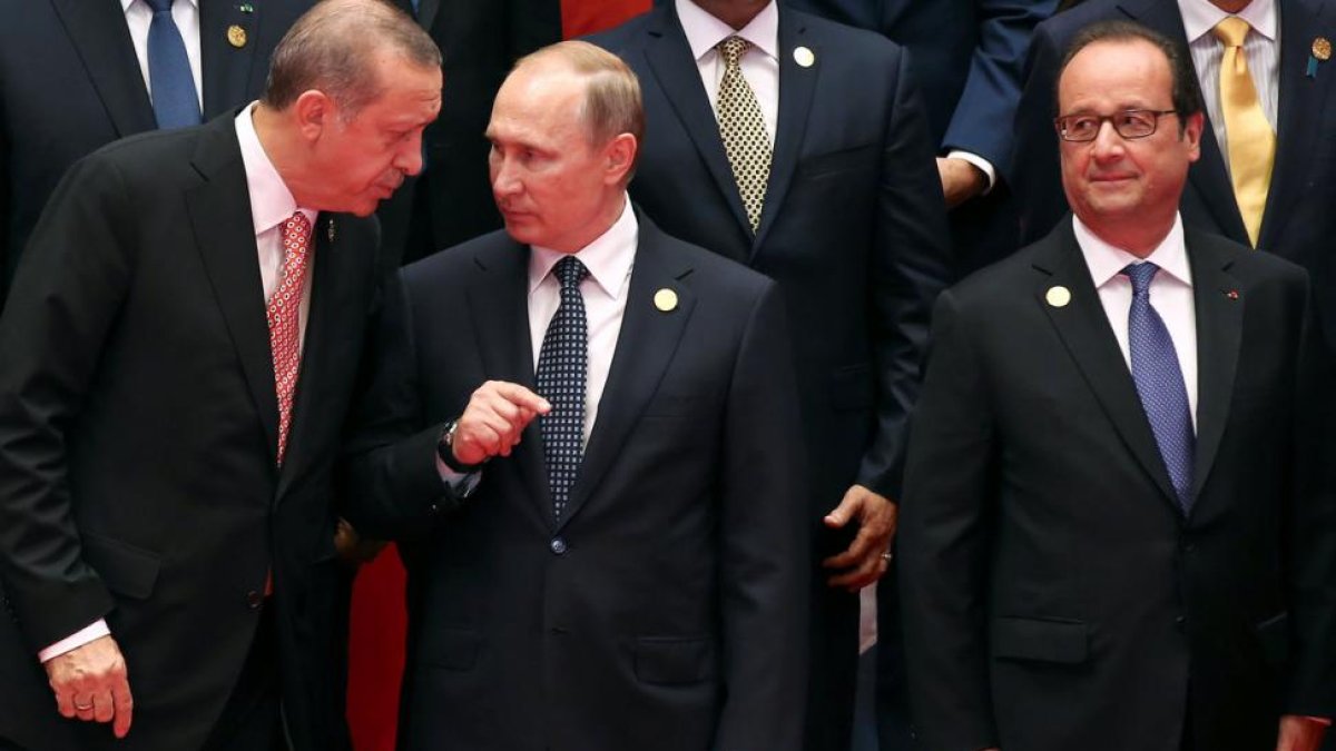 Hollande, Putin y Erdogan.-DAMIR SAGOLJ / REUTERS