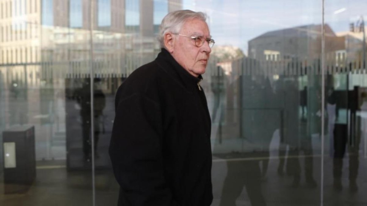Jordi Montull, a su llegada a una de las sesiones del juicio por el caso Palau.-ALBERT BERTRAN