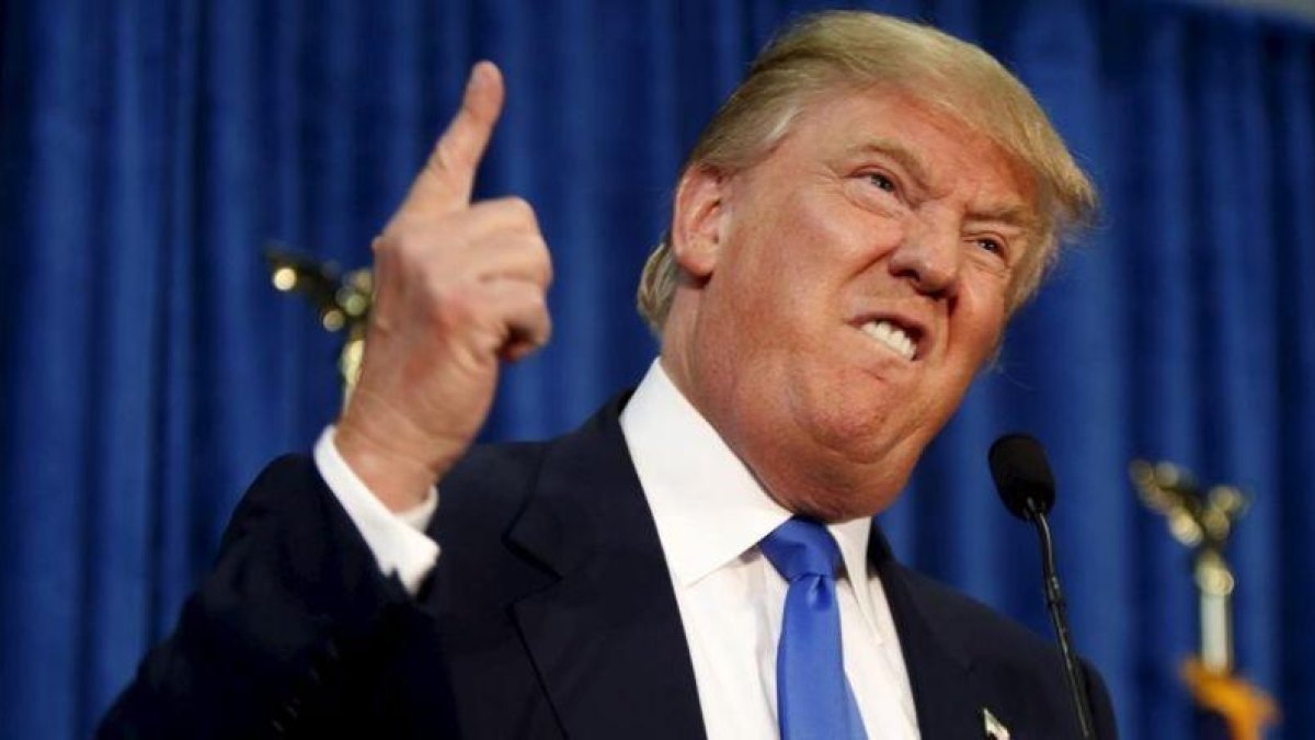 Donald Trump, en uno de sus gestos más característicos y parodiables.-REUTERS / DOMINICK REUTER