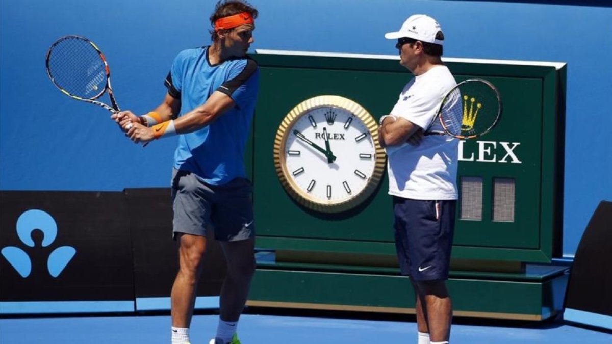 Toni Nadal, con Rafael, en el Abierto de Australia.-DAVID GRAY