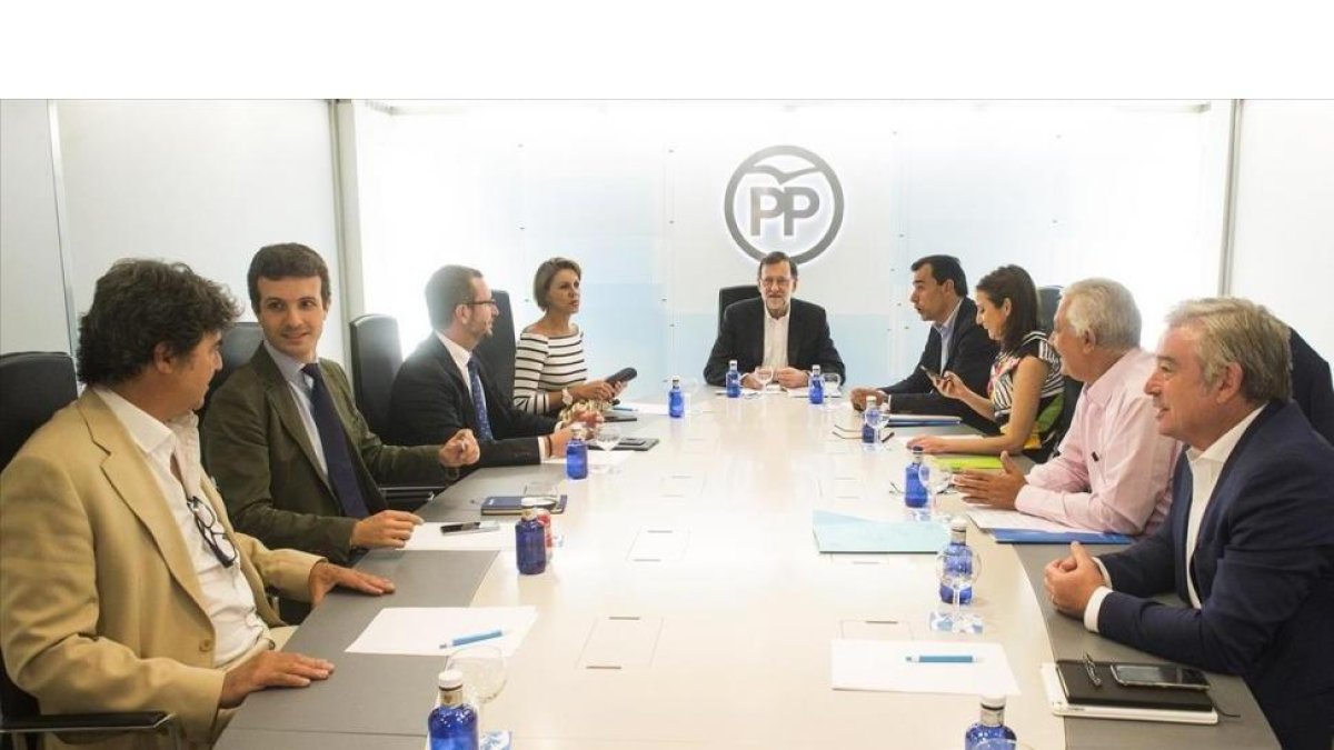 El líder del PP, Mariano Rajoy, al frente de una reciente reunión de su comité de dirección tras verse con Albert Rivera-EFE