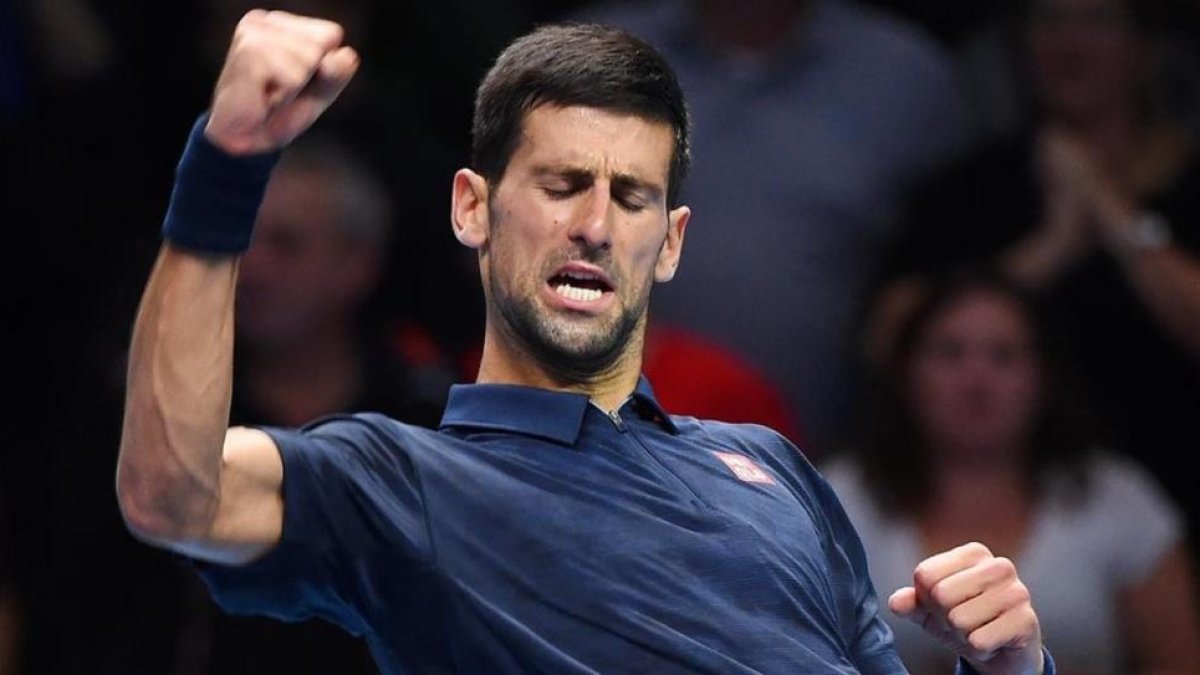 Djokovic celebra su truinfo ante Thiem en el estreno del Masters.-EFE / ANDY RAIN