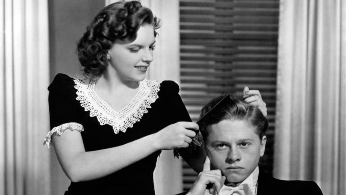 Judy Garland, con Mickey Rooney.-