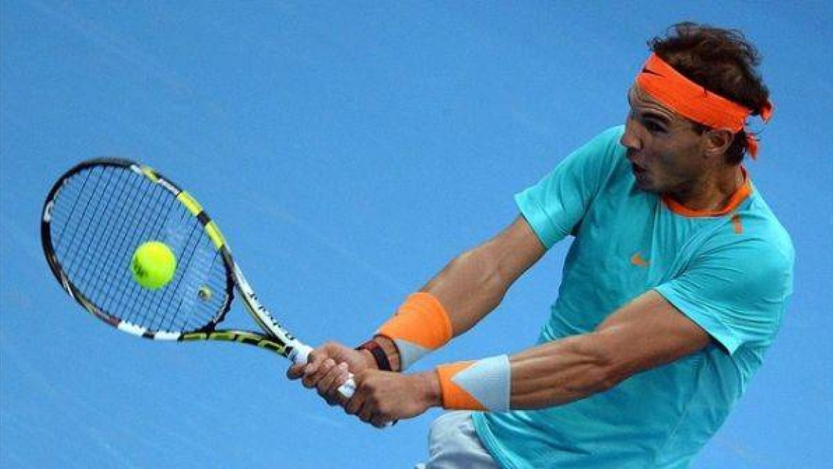 Nadal, en acción durante su partido ante Gasquet en Pekín.-Foto: GOH CHAI HIN / AFP