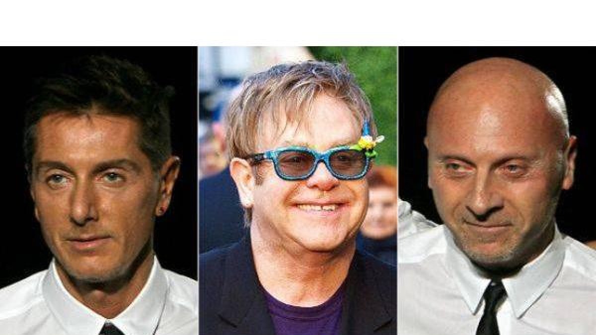 Domenico Dolce, Eltoh John y Stefano Gabbana.-