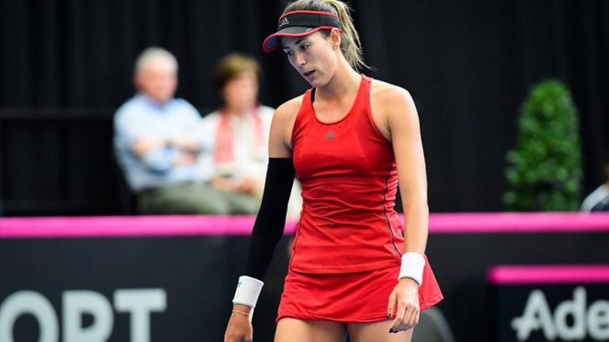 Muguruza, decepcionada tras caer en el primer partido ante Bélgica.-