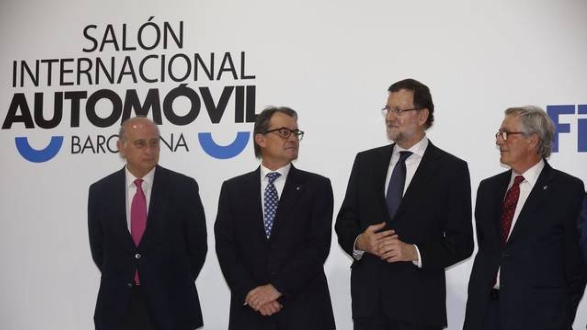 Mariano Rajoy, Alberto Fernández Díaz, Artur Mas y Xavier Trias en el Salón del Automóvil de Barcelona.-Foto:JULIO CARBÓ