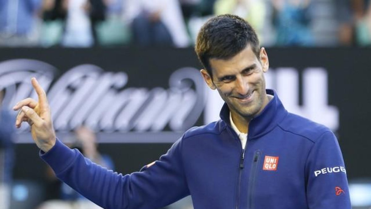 Novak Djokovic en el Grand Slam de Melbourne contra el francés Giles Simon.-EFE / MADE NAGI