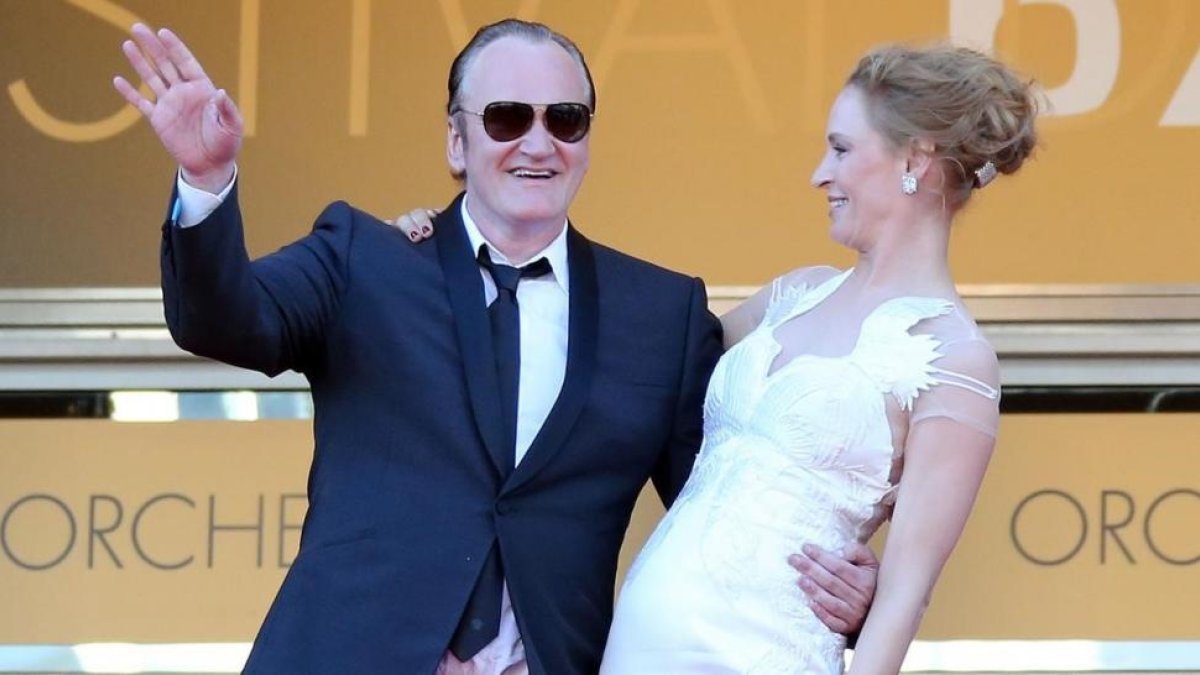 Thurman y Tarantino, en Cannes, en mayo del 2004.-AFP / LOIC VENANCE