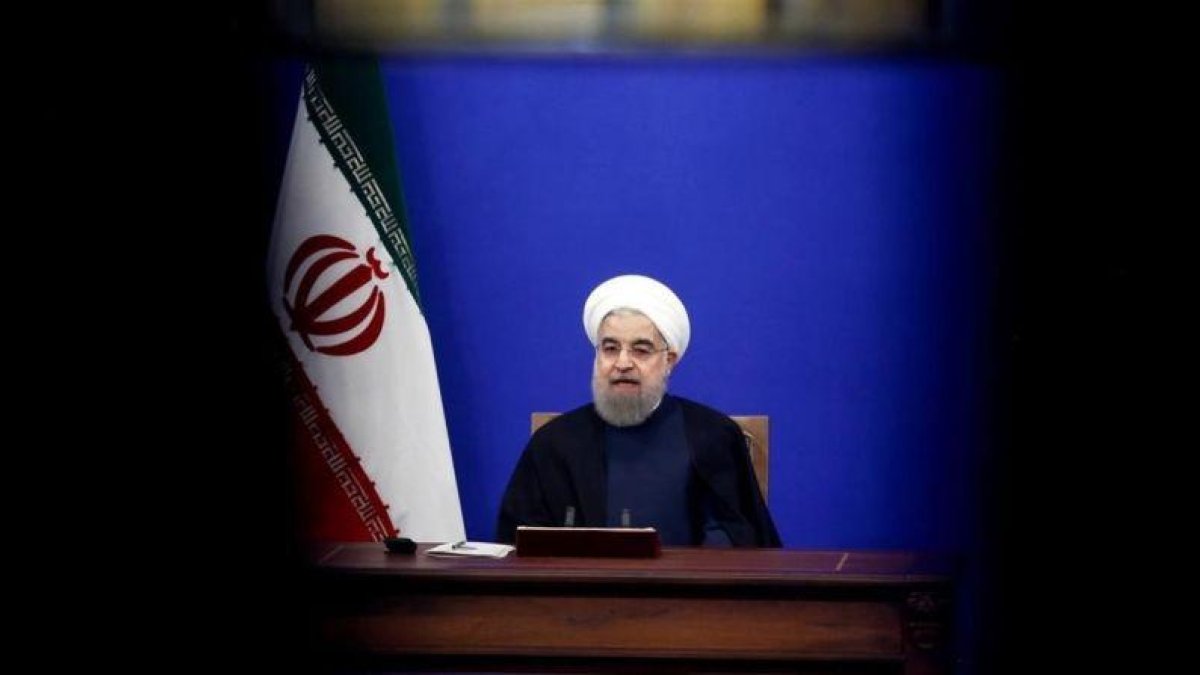 El presidente iraní, Hasán Rohaní, durante la entrevista televisiva tras la implementación de nuevas sanciones.-ATTA KENARE (AFP)