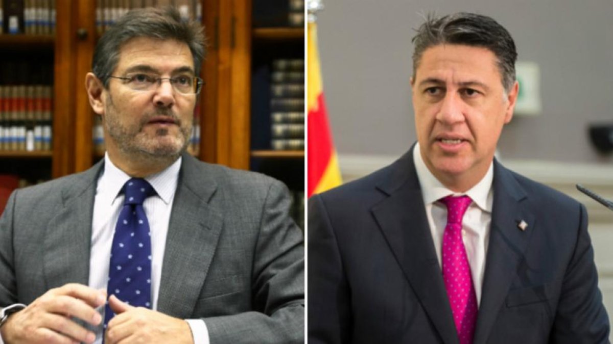 Rafael Catalá y Xavier García Albiol.-