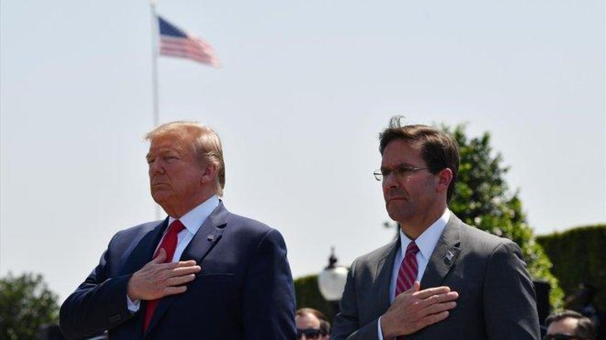 Donald Trump y Mark Espert.-