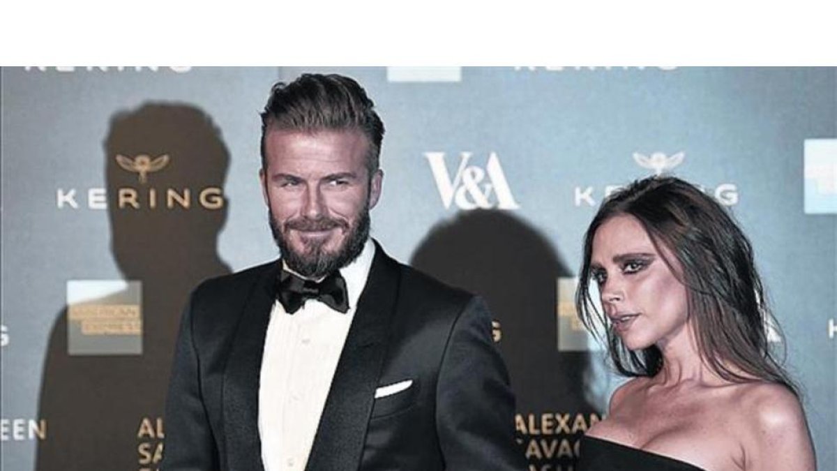 David y Victoria Beckham, una pareja habitual en los 'rankings'.-GETTY IMAGES / JORDI COTRINA / REUTERS