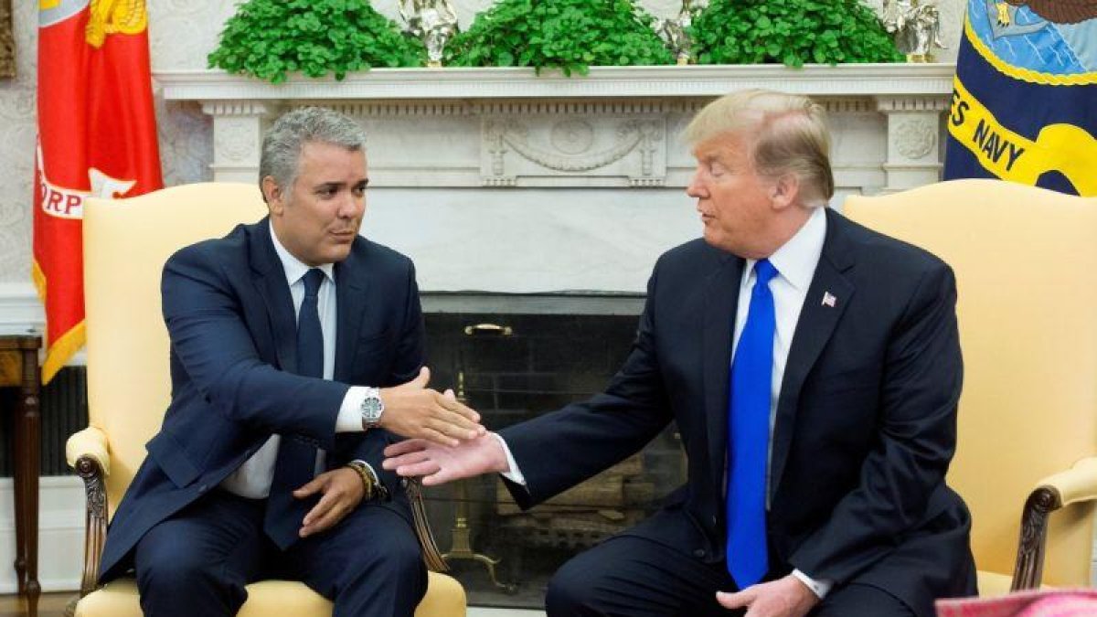 El presidente estadounidense Donald Trump recibe al presidente de Colombia Ivan Duque. EFE Michael Reynolds.-EPA