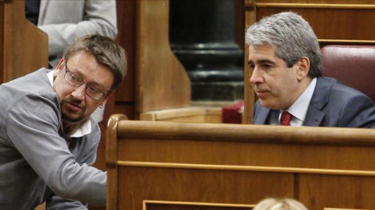Xavier Domènech y Francesc Homs, en el Congreso, el pasado mes de marzo.-AGUSTÍN CATALÁN