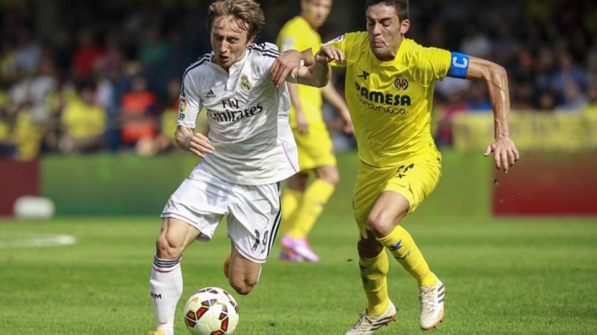Modric, durante un partido entre el Villarreal y el Madrid.-MIGUEL LORENZO
