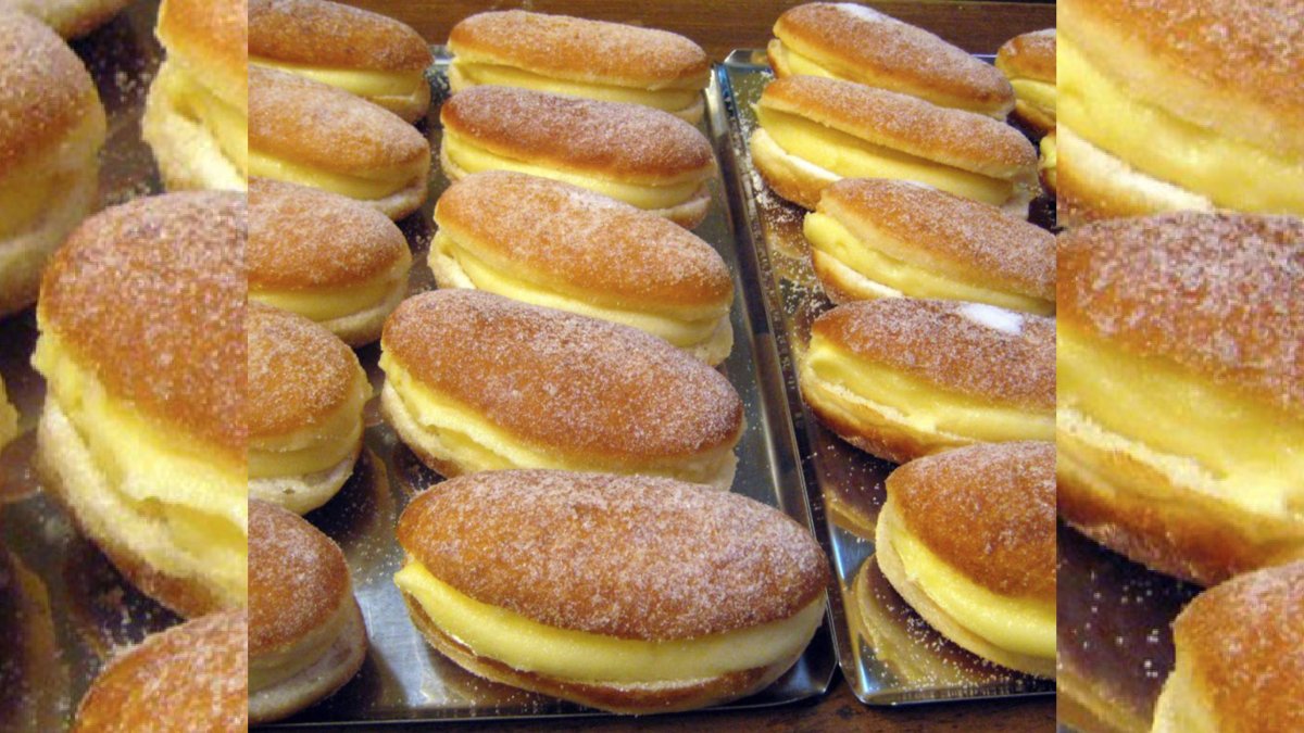 Los abisinios, uno de los dulces más emblemáticos de Valladolid, destacan por su masa frita, forma ovalada y relleno cremoso, una receta tradicional muy popular en Medina de Rioseco.