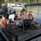 La Asociación Amigos del Pisuerga prepara la inmersión en el río.-E.M.