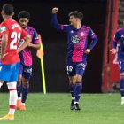 Real Valladolid's Portuguese midfielder Jota (C) celebrates after scoring a goal during the Spanish League football match between Granada FC and Real Valladolid FC at the Nuevo Los Carmenes stadium in Granada on November 22, 2020. (Photo by JORGE GUERRERO / AFP)