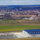 Los talleres de Renfe, junto a los terrenos para el parque agroalimentario.-E. M.