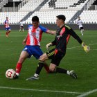 Una acción del partido entre Burgos CF B y el Atlético Tordesillas en El Plantío.